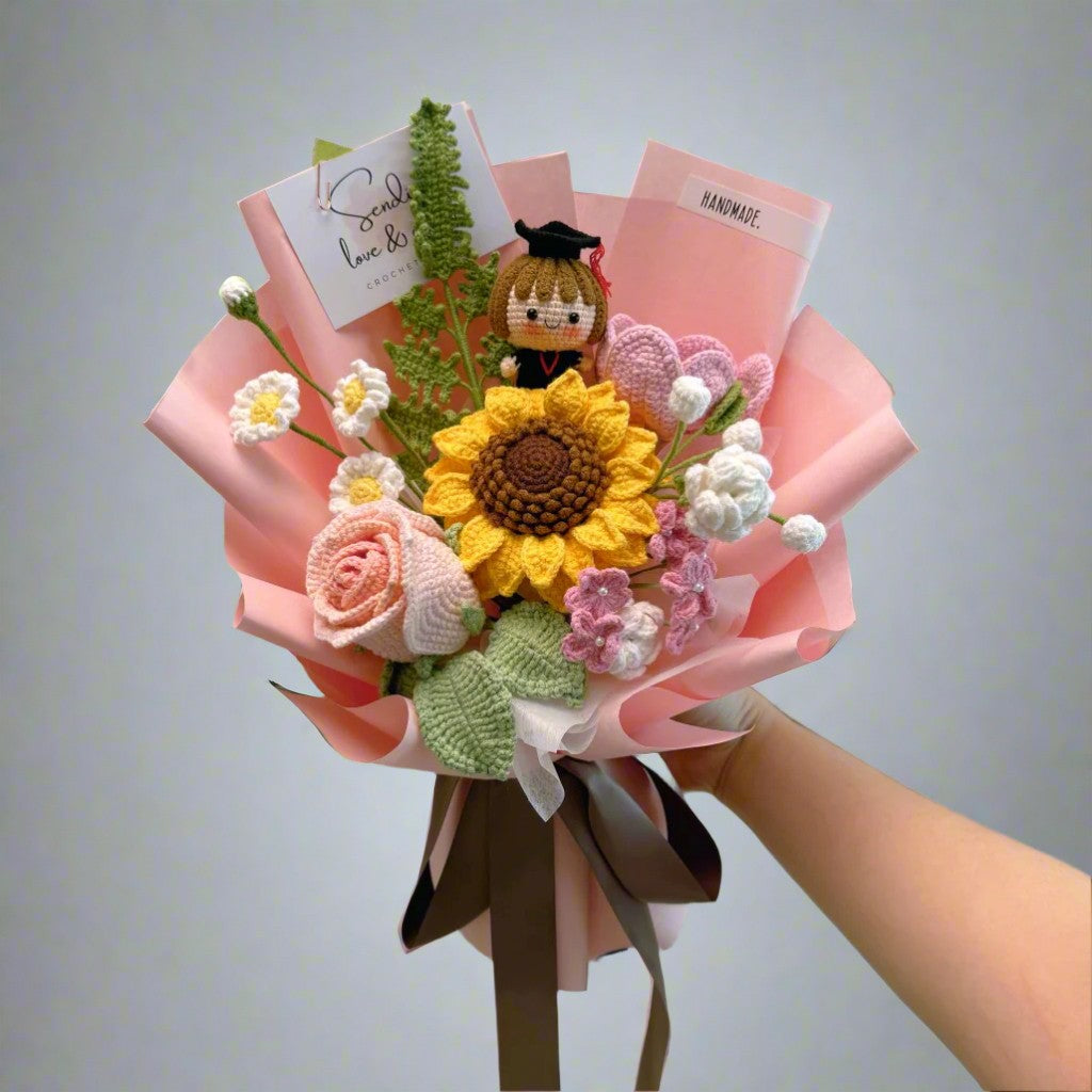 Handmade flower bouquet with a small figurine and cards on a light gray background