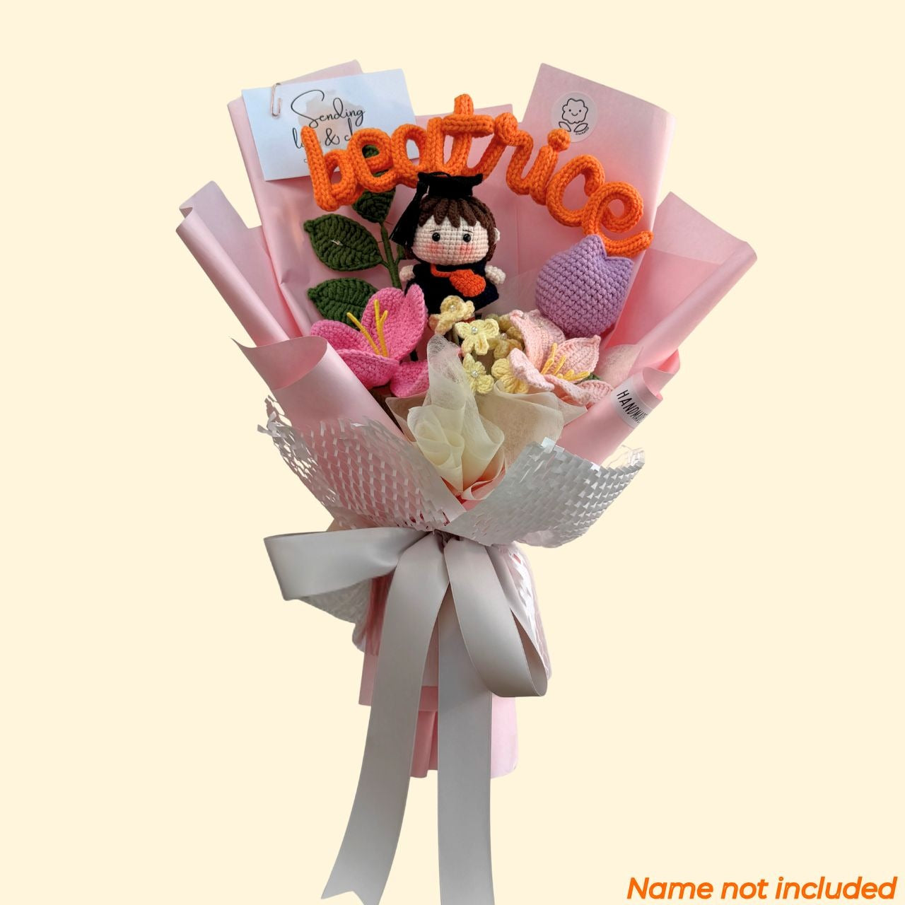Bouquet with personalized name 'beatrice' on a light pink background