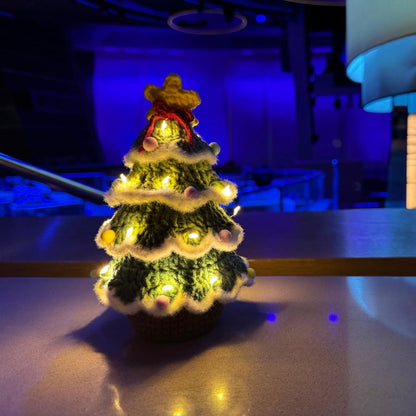 Lighted Crochet Christmas Tree in a dark room setting