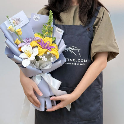 Person holding a bouquet of flowers wearing an apron with 'TSG.com' branding.