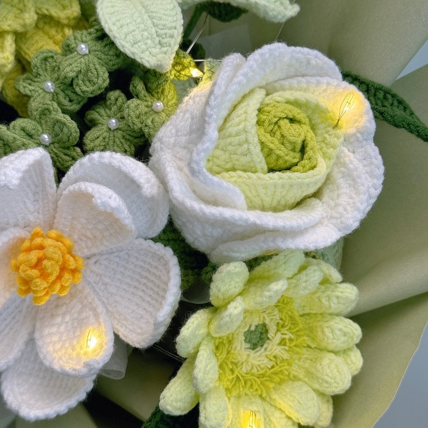 Knitted flowers with LED lights on a light background