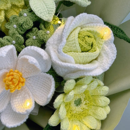 Knitted flowers with LED lights on a light background