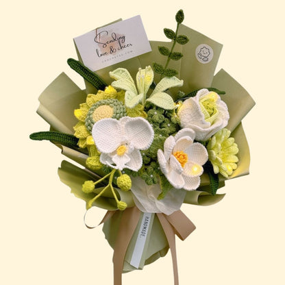 Knitted flower bouquet with green and yellow tones on a beige background