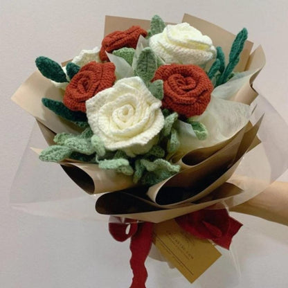 A bouquet of crochet red and white roses